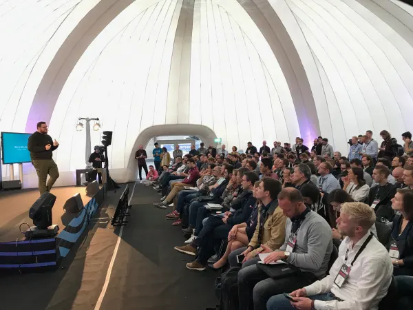 Live during SaaStock Europe 2018 — Growth Stage talk with attendees standing along the dome wall at right because the seats were full, packed crowd from front-row to back