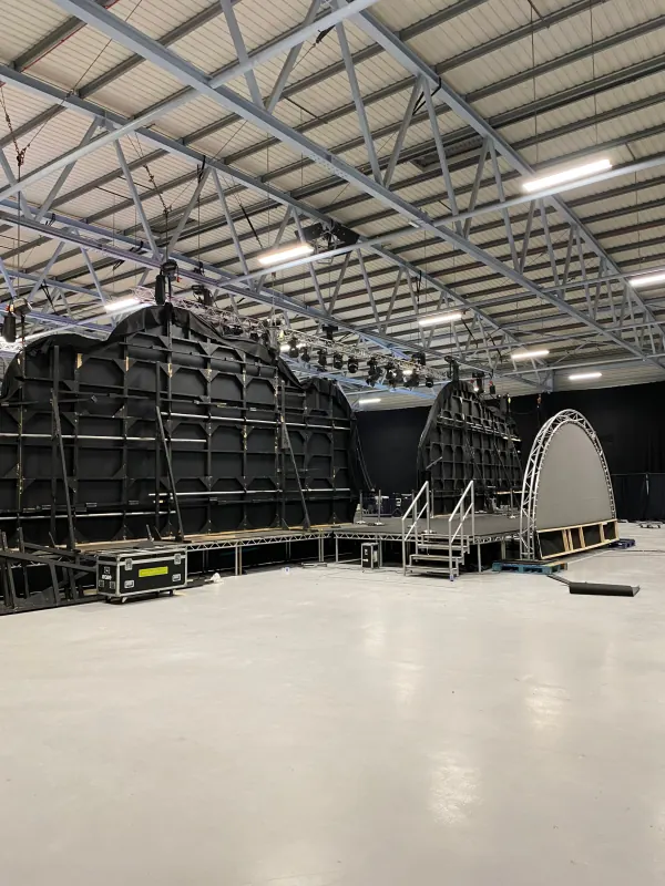 Behind the scenes at SaaStock Europe 2023 — Mainstage rigging and modular LED wall sections being assembled at RDS Simmonscourt for the Dublin conference