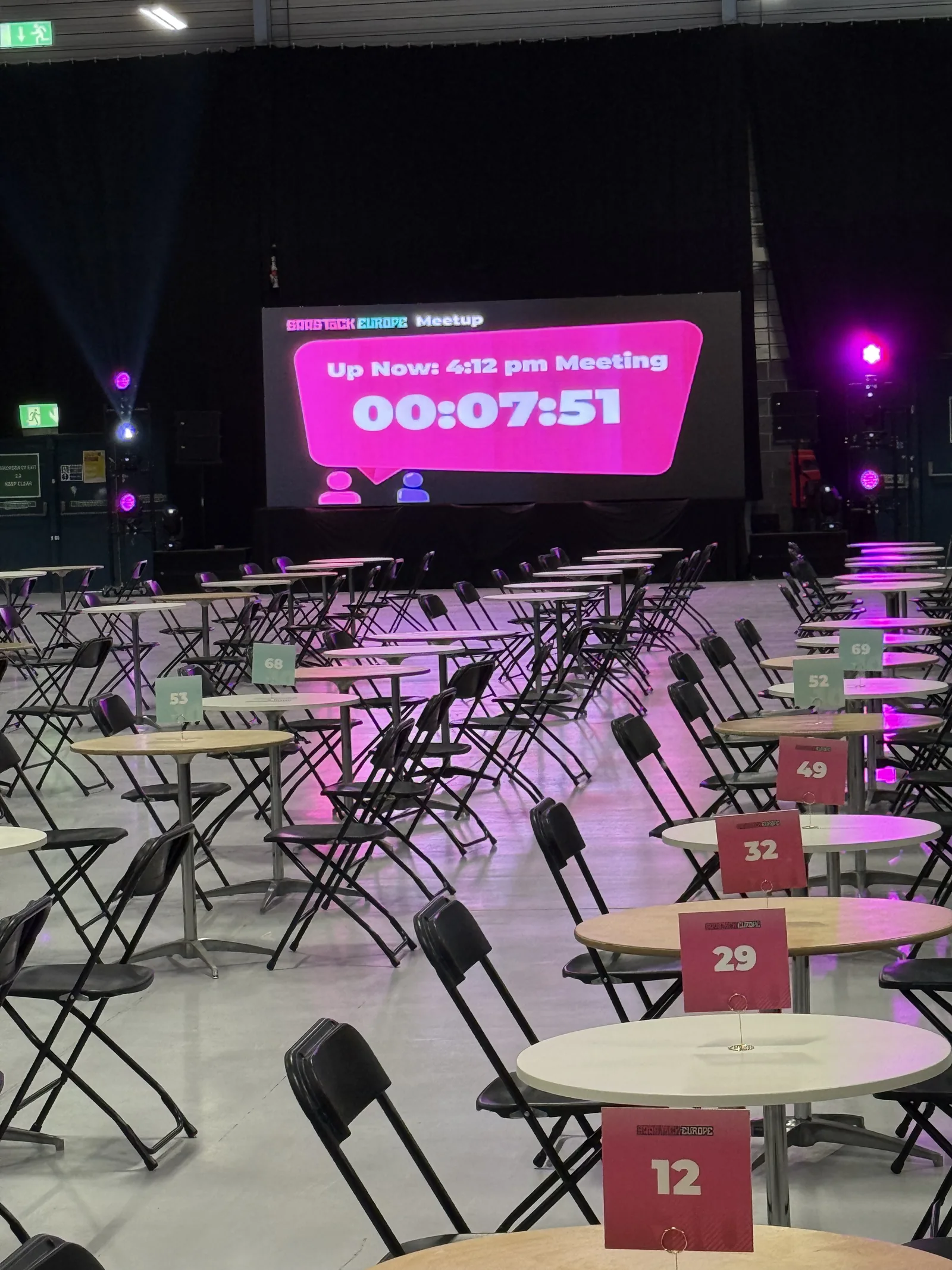 300+ one-on-one founder meeting tables at SaaStock Europe 2025 with the live 'Up next — 4:02 pm meeting' countdown screen above