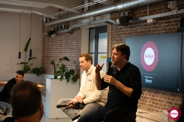 Live at SaaStock Local Amsterdam Q2 2024 — Koen Stam gestures upward mid-answer with the Lepaya co-founder smiling beside him