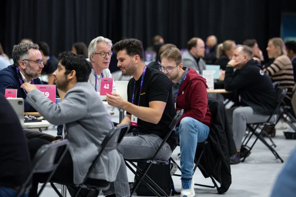 ElasticScale founder Alex Jeensma in a meeting at SaaStock Europe 2025